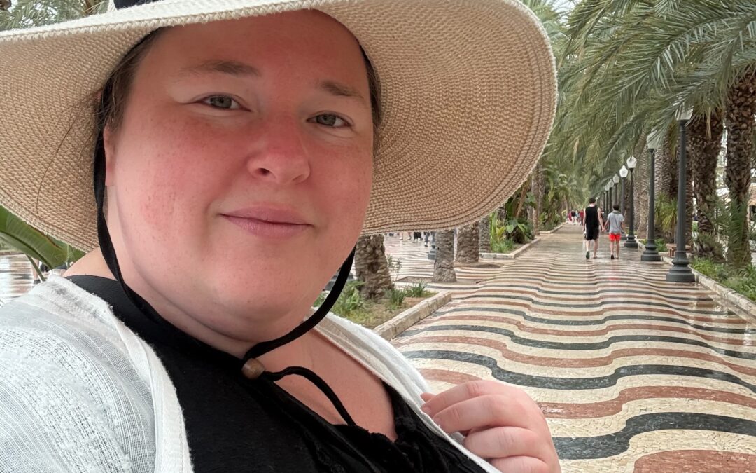 Traveling alone on a solo travel adventure, selfie taken in Alicante
