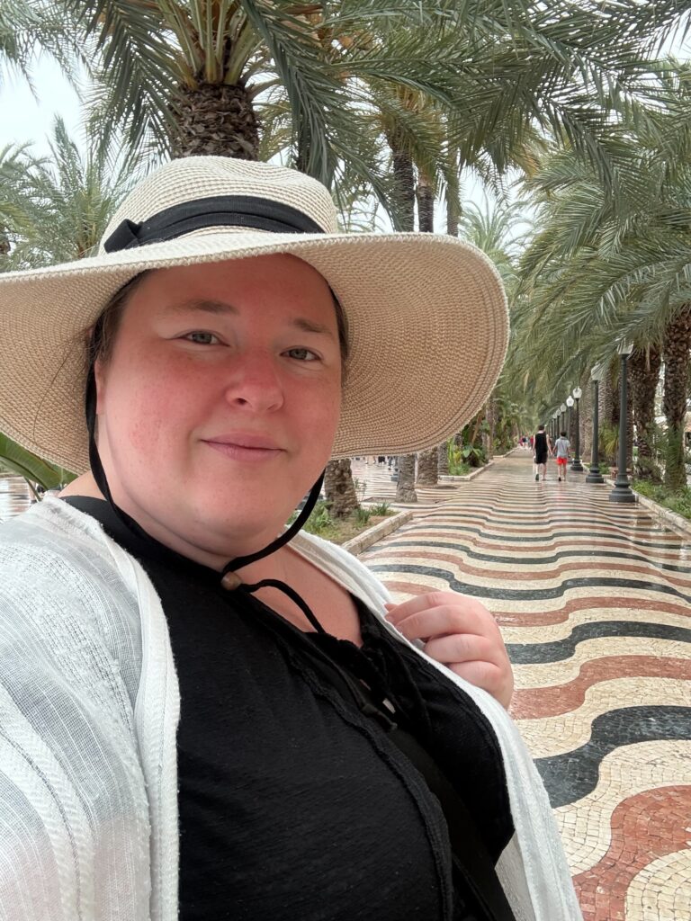 Traveling alone on a solo travel adventure, selfie taken in Alicante